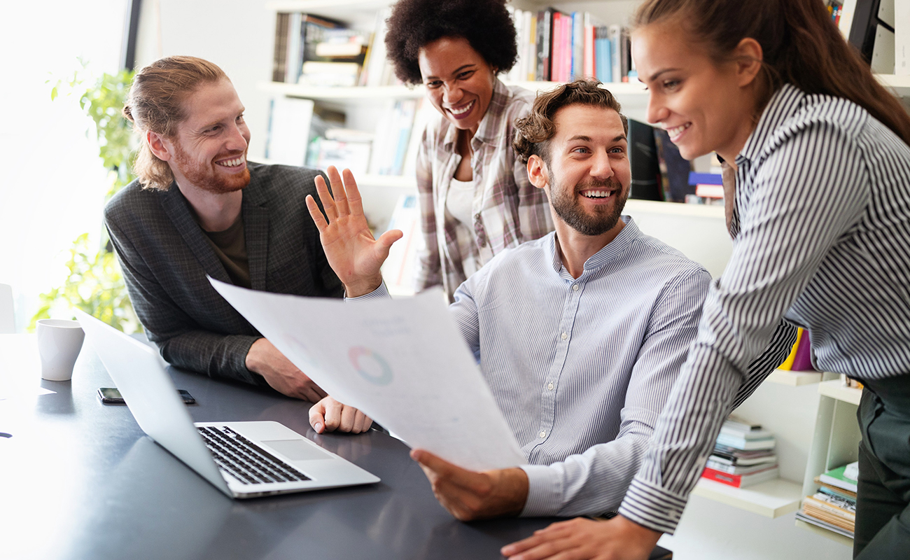 Business team reviewing plans together